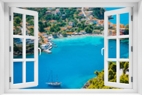 Fototapeta Naklejka Na Ścianę Okno 3D - Assos village in morning light, Kefalonia. Greece. White lonely yacht in beautiful turquoise colored bay lagoon water surrounded by pine and cypress trees along the coastline