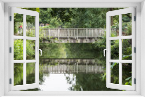 Fototapeta Naklejka Na Ścianę Okno 3D - A small wooden bridge
