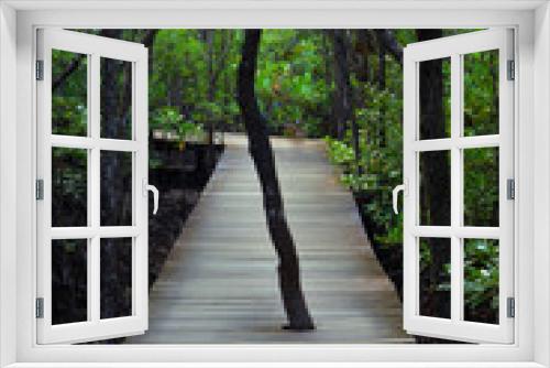 Fototapeta Naklejka Na Ścianę Okno 3D - wooden bridge walkway in forest
