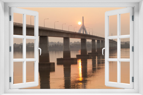 Fototapeta Naklejka Na Ścianę Okno 3D - Bridge across the Mekong River. Thai-Lao friendship bridge on sunrise, Thailand.