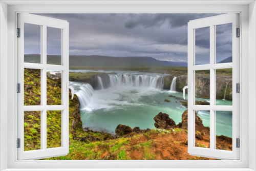 Fototapeta Naklejka Na Ścianę Okno 3D - Godafoss Waterfalls Blue Green Water Cloudy Sky