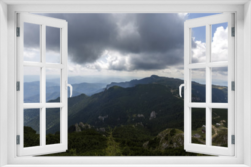 Fototapeta Naklejka Na Ścianę Okno 3D - View of the Ocolasul Mare peak from the Toaca peak in Romania Carpathians