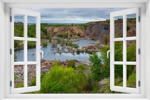 Fototapeta Naklejka Na Ścianę Okno 3D - The beautiful scenery of abandoned sandstone quarry with the lake on the bottom