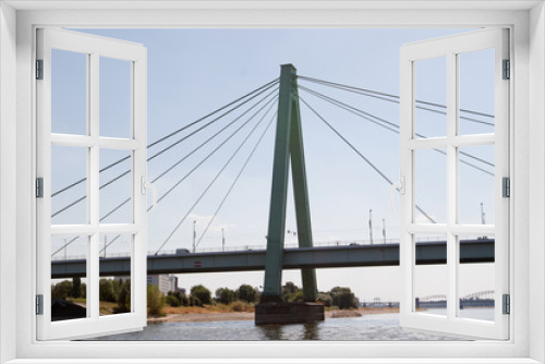 Fototapeta Naklejka Na Ścianę Okno 3D - nahansicht der severinsbrücke am rhein in Köln Deutschland fotografiert während einer Sighteeing Bootstour auf dem Rhein mit einem Weitwinkelobjektiv