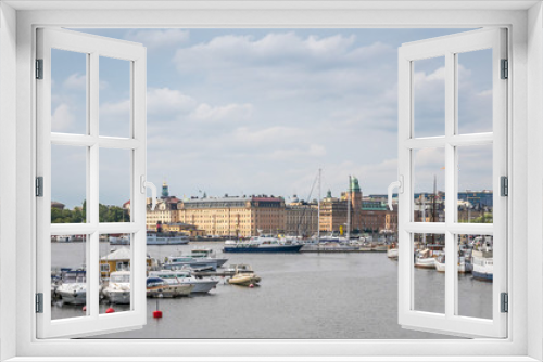 Fototapeta Naklejka Na Ścianę Okno 3D - Boats on the river in old part of Stockholm, 2 august 2018 Sweden