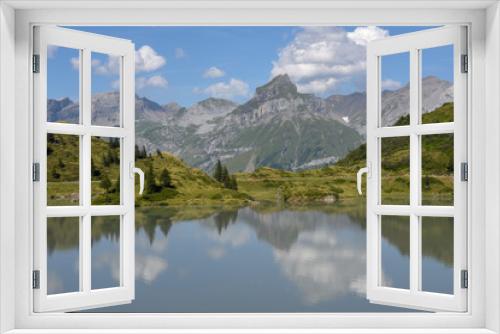 Fototapeta Naklejka Na Ścianę Okno 3D - Lake Truebsee over Engelberg on the Swiss alps