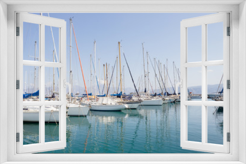 Fototapeta Naklejka Na Ścianę Okno 3D - Marina port ships yachts in Agios Nikolaos bay, Crete, Greece