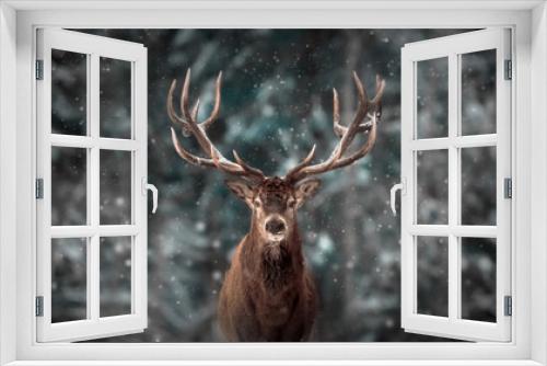 Fototapeta Naklejka Na Ścianę Okno 3D - Noble deer male in winter snow forest. Artistic winter christmas landscape.