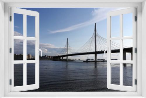 Fototapeta Naklejka Na Ścianę Okno 3D - Panorama of the suspension bridge across the River in the city