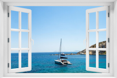 Fototapeta Naklejka Na Ścianę Okno 3D - Picturesque bay between the Datca Peninsula and the island of Knidos, indented coastline between of mediterranean and aegean seas with beautiful turquoise water, sailboat in the middle, Turkey