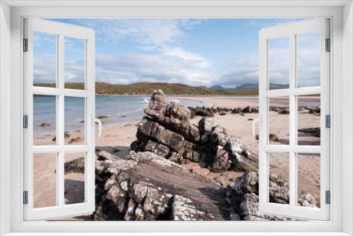 Fototapeta Naklejka Na Ścianę Okno 3D - Achnahaird Beach in Wester Ross, Scottish Highlands. Quiet, cresent shaped beach on the north west coast of Scotland, with mountains in the background.