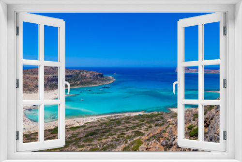 Fototapeta Naklejka Na Ścianę Okno 3D - Balos lagoon (Balos beach) on Crete island. Tourists relax and bath in crystal clear water of Mediterranean Sea, Greece.