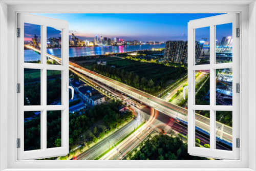 Fototapeta Naklejka Na Ścianę Okno 3D - busy traffic road with city skyline in hangzhou china