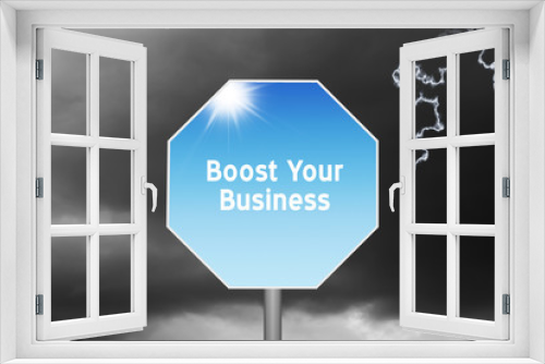 Boost your business sign on stormy background with lightning and text success concept