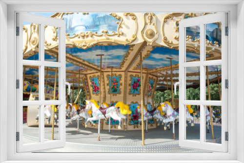 Fototapeta Naklejka Na Ścianę Okno 3D - carousel in the recreation park, spinning in the carousel