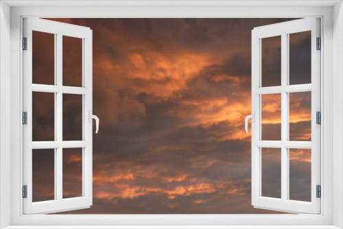 Fototapeta Naklejka Na Ścianę Okno 3D - Wolken im Sonnenuntergang