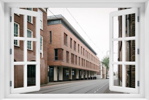 Fototapeta Naklejka Na Ścianę Okno 3D - Residential buildings with brick facade in city centre of the Ha