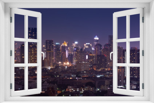 Fototapeta Naklejka Na Ścianę Okno 3D - night cityscape metropolis downtown lighting up on skyline
