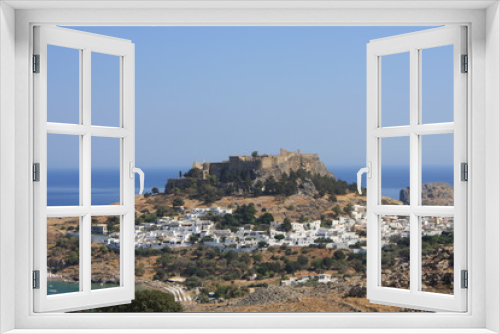 Fototapeta Naklejka Na Ścianę Okno 3D - View of village, bay and Acropolis of Lindos (Rhodes, Greece)