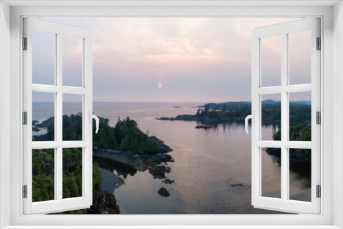 Fototapeta Naklejka Na Ścianę Okno 3D - Aerial panoramic seascape view of Pacific Ocean Coast during a cloudy summer sunset. Taken in Ucluelet, Vancouver Island, BC, Canada.
