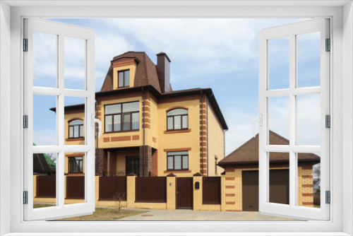 Fototapeta Naklejka Na Ścianę Okno 3D - New two-storeyed brick house