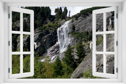 Fototapeta Naklejka Na Ścianę Okno 3D - Waterfall at a pass road in Austria in early autumn 
