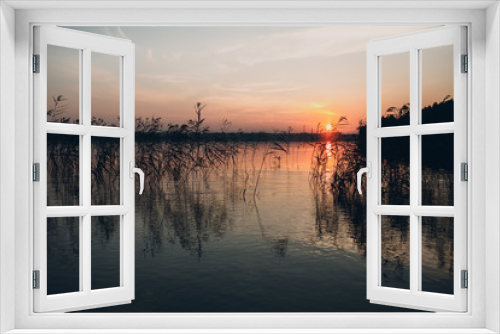 Fototapeta Naklejka Na Ścianę Okno 3D - Sunset over the lake
