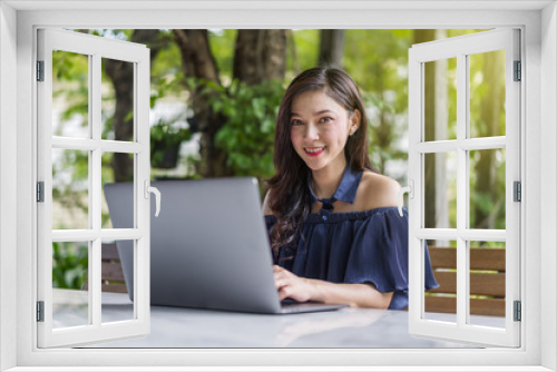 woman using laptop computer