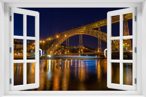 Fototapeta Naklejka Na Ścianę Okno 3D - Die erleuchtete Brücke Dom Luis I über den Douro in Porto bei Nacht