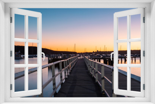 Fototapeta Naklejka Na Ścianę Okno 3D - Perspective view of Balmoral Beach pier at dawn. Sydney, Australia.