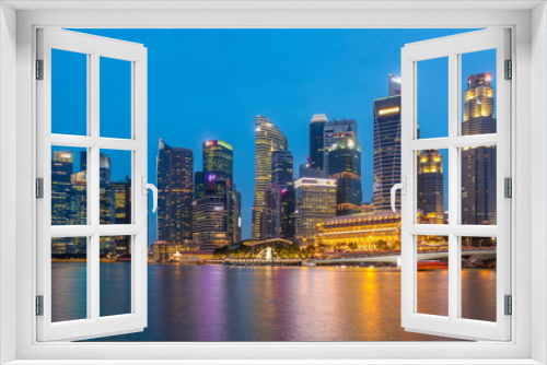 Fototapeta Naklejka Na Ścianę Okno 3D - Stunning twilight view of Singapore city cityscape skyscrapers day to night timelapse