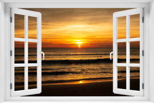 Fototapeta Naklejka Na Ścianę Okno 3D - Karon Beach Sunset with Sun at Horizon