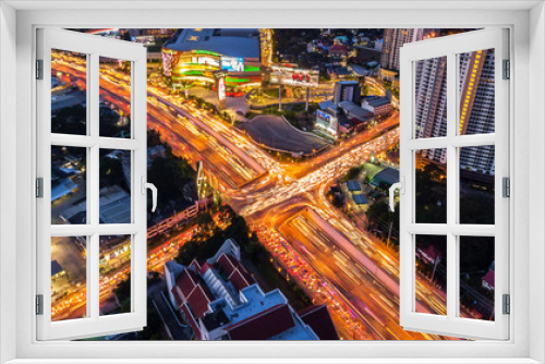 Fototapeta Naklejka Na Ścianę Okno 3D - CHIANG MAI, THAILAND- AUGUST 7, 2018 : City x cross traffic express way intersection road with light of vehicle aerial view, drone view.