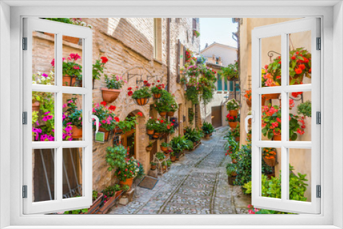 Fototapeta Naklejka Na Ścianę Okno 3D - Scenic sight in Spello, flowery and picturesque village in Umbria, province of Perugia, Italy.