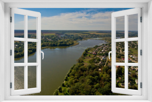 Fototapeta Naklejka Na Ścianę Okno 3D - Aerial view of the lake in the vilage.