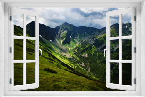 Fototapeta Naklejka Na Ścianę Okno 3D - green rocky mountain valley