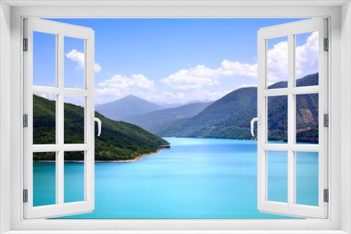 Fototapeta Naklejka Na Ścianę Okno 3D - Azure water in a blue sea lagoon among green mountains blue sky white clouds background, paradise on earth, nobody
