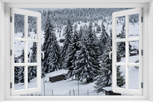 Fototapeta Naklejka Na Ścianę Okno 3D - Alpine village in winter in Transylvania