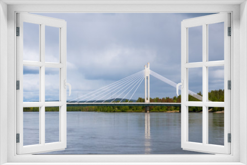 Fototapeta Naklejka Na Ścianę Okno 3D - Yatkianküntill bridge across the river Kemijoki, Rovaniemi, Finland