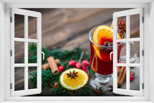 Fototapeta Naklejka Na Ścianę Okno 3D - Christmas mulled wine with spices or tea, hot drink on table