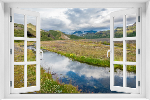 Fototapeta Naklejka Na Ścianę Okno 3D - Glacial river in the dramatically beautiful and surreal landscapes of Thorsmork valley in the Highlands of Iceland at southern end of the famous Laugavegur hiking trail.