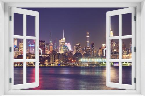 Fototapeta Naklejka Na Ścianę Okno 3D - New York City waterfront panorama at night, USA.