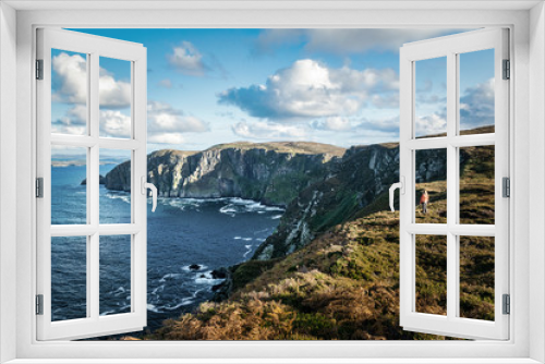 Fototapeta Naklejka Na Ścianę Okno 3D - A Person Alone on a Sea cliff