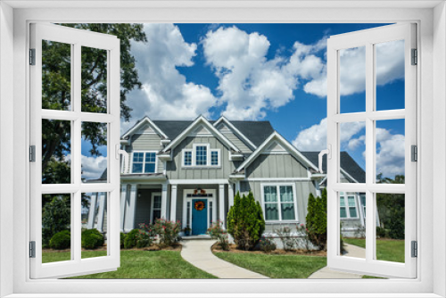 Fototapeta Naklejka Na Ścianę Okno 3D - Gray New Construction Modern Cottage Home with Hardy Board Siding and Teal Door with Curb Appeal