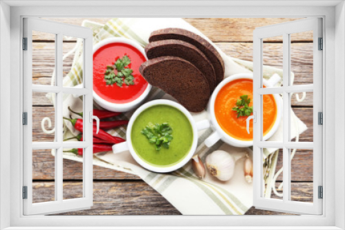 Fototapeta Naklejka Na Ścianę Okno 3D - Vegetable cream soup with parsley on grey wooden table