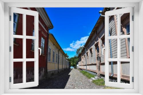 Fototapeta Naklejka Na Ścianę Okno 3D - One of Old Rauma's streets that looked so empty without the people passing by.