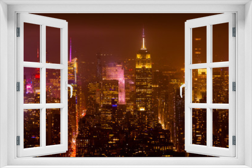 Fototapeta Naklejka Na Ścianę Okno 3D - New York city skyline and skyscraper at night,Beautiful night view in Midtown Manhatton