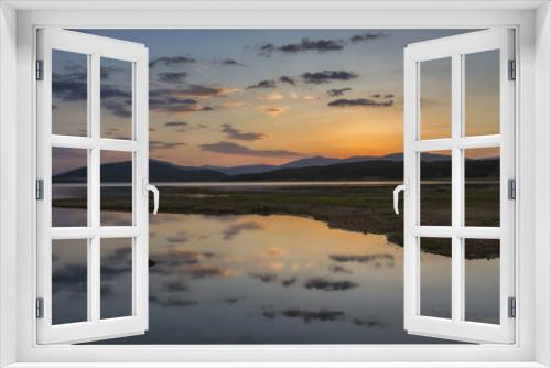 Fototapeta Naklejka Na Ścianę Okno 3D - Colorful, spectacular sunset over Balkan mountain and artificial lake Jrebchevo. Last rays of light. Landscape, background.