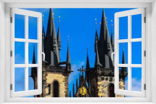 Fototapeta Naklejka Na Ścianę Okno 3D - Czech, Prague Castle two towers on a dark blue sky. Beautiful mystical gothic cathedral architecture exterior.