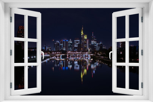 Fototapeta Naklejka Na Ścianę Okno 3D - Nächtlicher Blick auf die Skyline von Frankfurt am Main, Hessen, Deutschland 